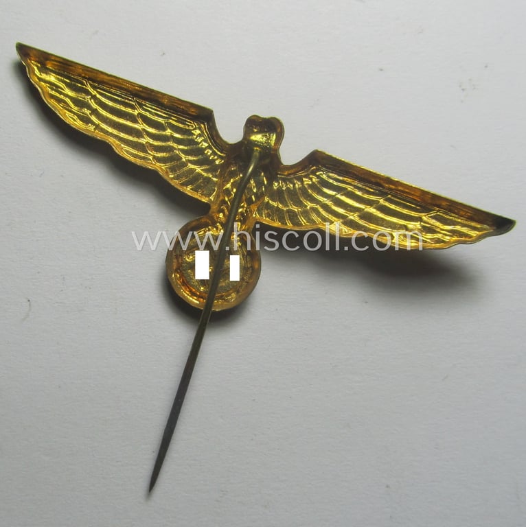 WH (Kriegsmarine) 'single-pattern'-eagle-pin being a non-marked example as was intended for attachment to the (darker-blue- ie. white-topped-) so-called: 'Tellermützen'
