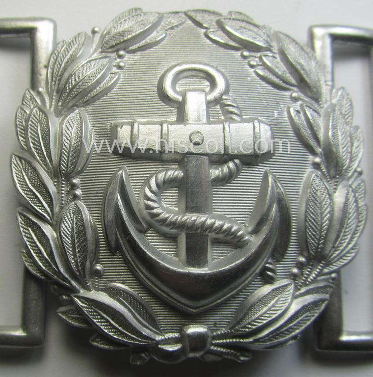 'Virtually mint', WH (Kriegsmarine) 'standard-issue'-pattern, silver-toned- and/or typical aluminium-based officers'-dress-model belt-buckle (ie. 'Paradefeldbinde für Beambten der KM') being a neatly maker- (ie. 'F.L.L.'-) marked example