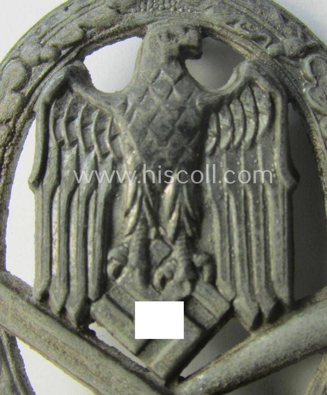 'Allgemeines Sturmabzeichen' (or: General Assault Badge ie. GAB) being a typical unmarked, zinc-based- (ie. 'Feinzink'-) and/or: 'semi-hollow-back'-version as was (I deem) produced by the: 'Rudolf Karneth'-company