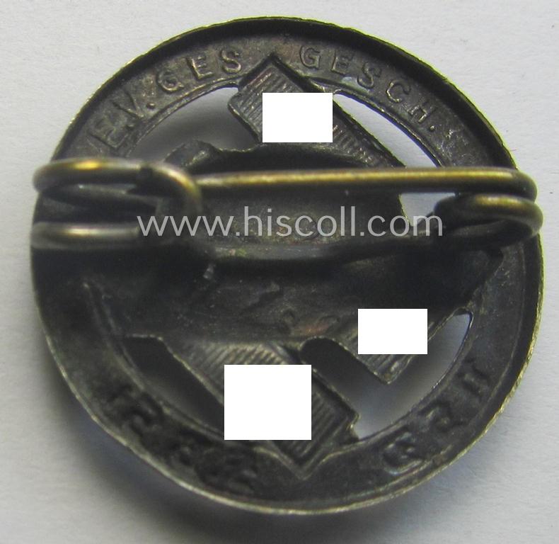Membership lapel-pin: 'Nationalsozialistischer Deutscher Frontkämpferbund Stahlhelm' (or: 'N.S.D.F.B.St.') being a very detailed- and/or: maker- (ie. 'E.V.' - 'Ges.Gesch'-) marked example that is executed in silver-toned 'Buntmetall'