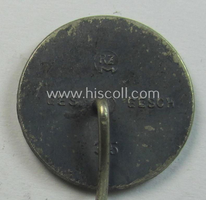 Attractive, so-called: N.S.V. (ie. 'Nationalsocialistische Volkswohlfahrt') membership-lapel-pin being an 'RzM - 35'-marked example as executed in silverish-black-toned 'Buntmetall'