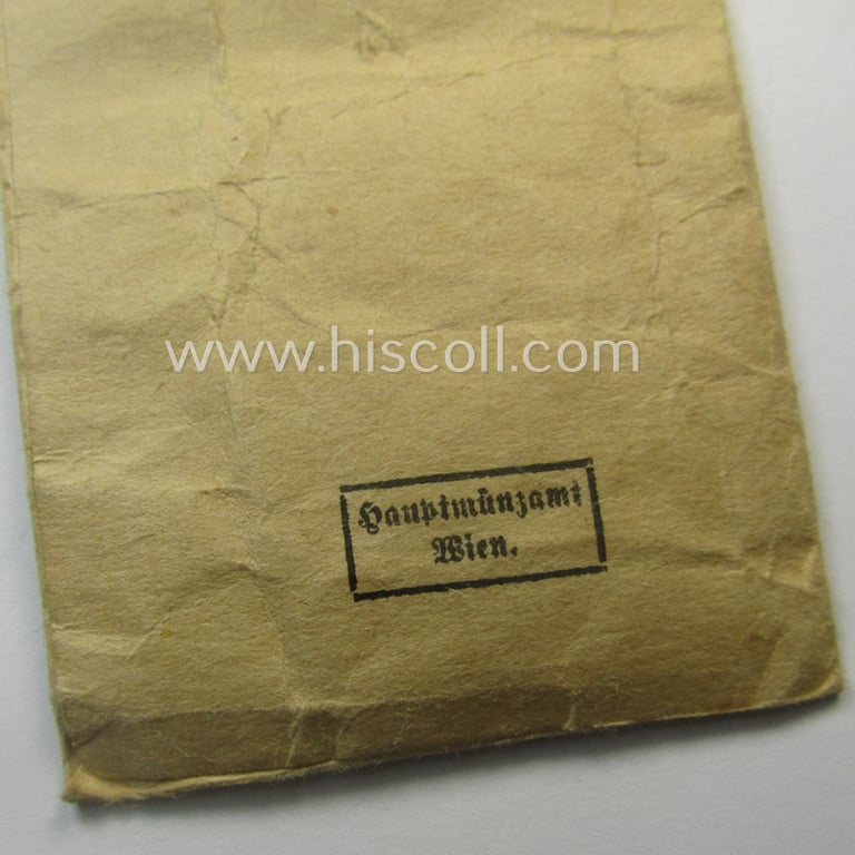 Medal-set: 'Medaille für Deutsche Volkspflege' packed in its original pouch of issue by the: 'Hauptmünzamt - Wien'