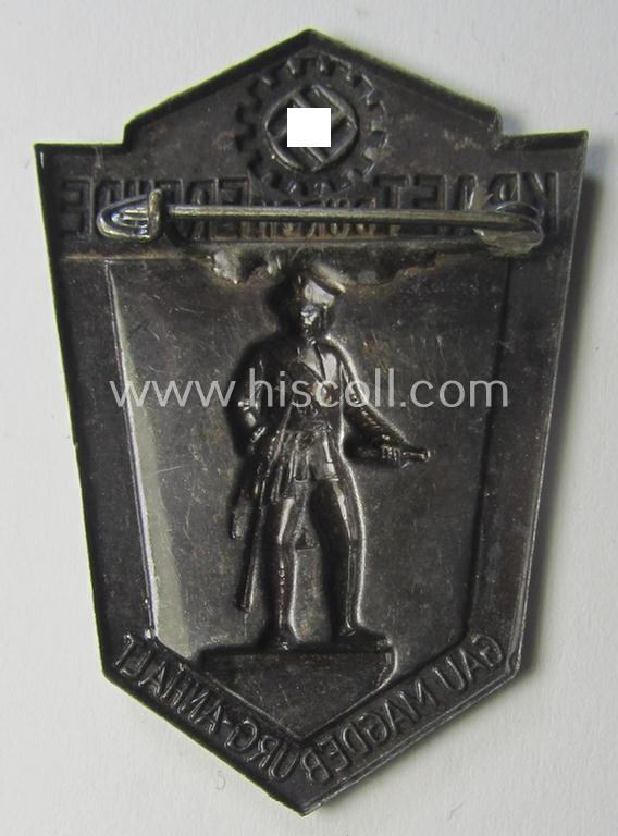 Attractive, commemorative TR-period day-badge (ie. 'tinnie') as issued to commemorate a DAF- (ie. KDF-) related gathering depicting an illustration of a Napoleontic-era soldier and text: 'Kraft durch Freude - Gau Magdeburg-Anhalt'