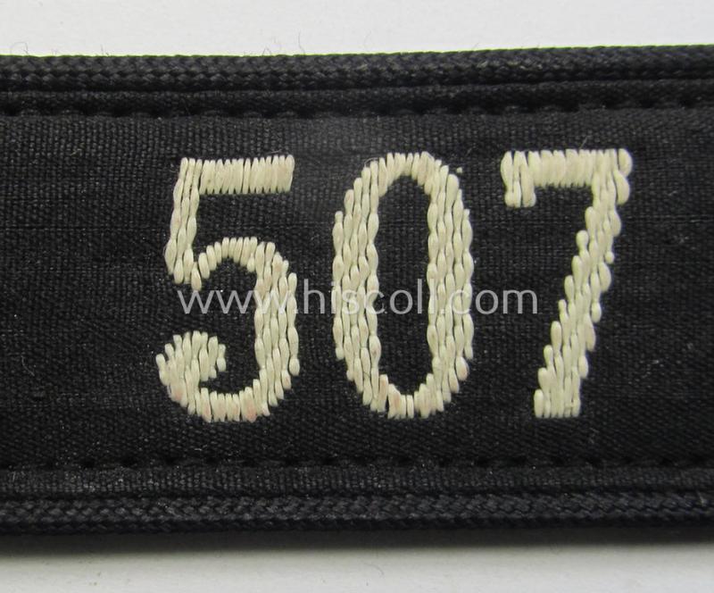Neat - and naturally single! - black-piped 'DJ- o. Deutsches Jungvolk' shoulderstrap as was intended for usage by a: 'DJ-Mitglied' who served within the: 'Bann 507' (507 = 'Wien-West') and that comes with its period-attached 'RzM'-etiket