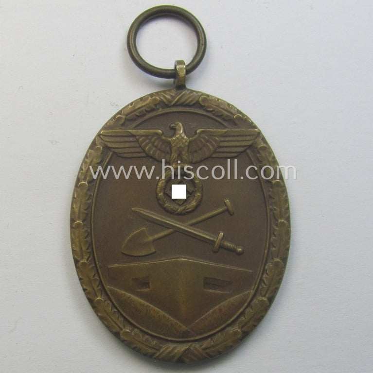 Medal-set: 'Deutsches Schutzwall Ehrenzeichen' (aka: 'Westwall'-medal) being a non-maker-marked- and/or: 'Buntmetall'-based specimen