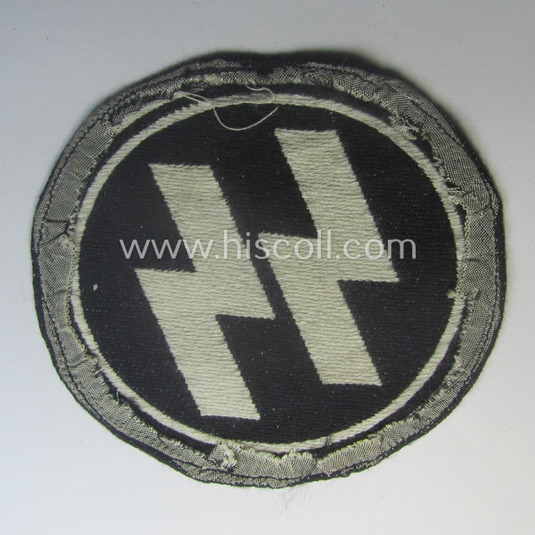 Waffen-SS sport-shirt emblem as executed in the neat 'BeVo'-weave pattern that is void of an: 'RzM'-etiket and that comes in an overall nice- (ie. moderately used- ie. tunic-attached-), condition