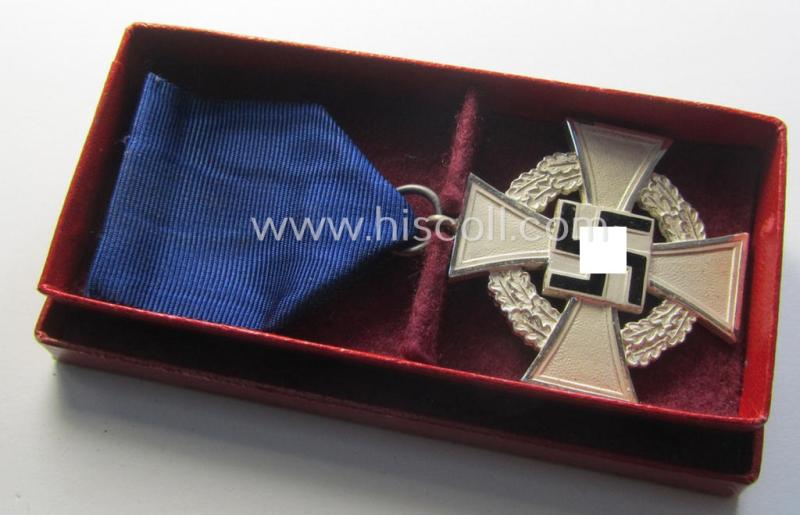 Neat, 'Treuedienst Ehrenzeichen 2. Klasse' being a non-maker-marked example that came mounted onto its original ribbon (ie. 'Bandabschnitt') and that came stored in its non-maker-marked etui (ie. two-pieced box)