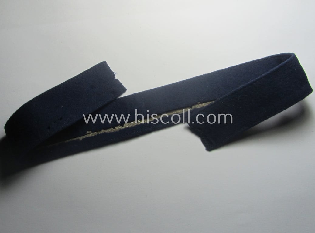 Truly worn, WH (Luftwaffe) cuff-title ie. armband (ie. 'Ärmelstreifen') entitled: 'Geschwader Hindeburg' that comes in a clearly issued- and/or moderately worn, condition