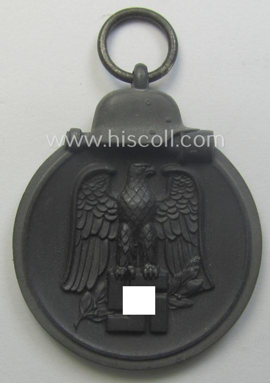 Medal-set: 'Winterschlacht im Osten 1941/42' as produced by the: 'Förster & Barth'-company being a clearly maker- (ie. '10'-marked) specimen that came stored in its original 'Zellstoff'-based pouch of issue as found
