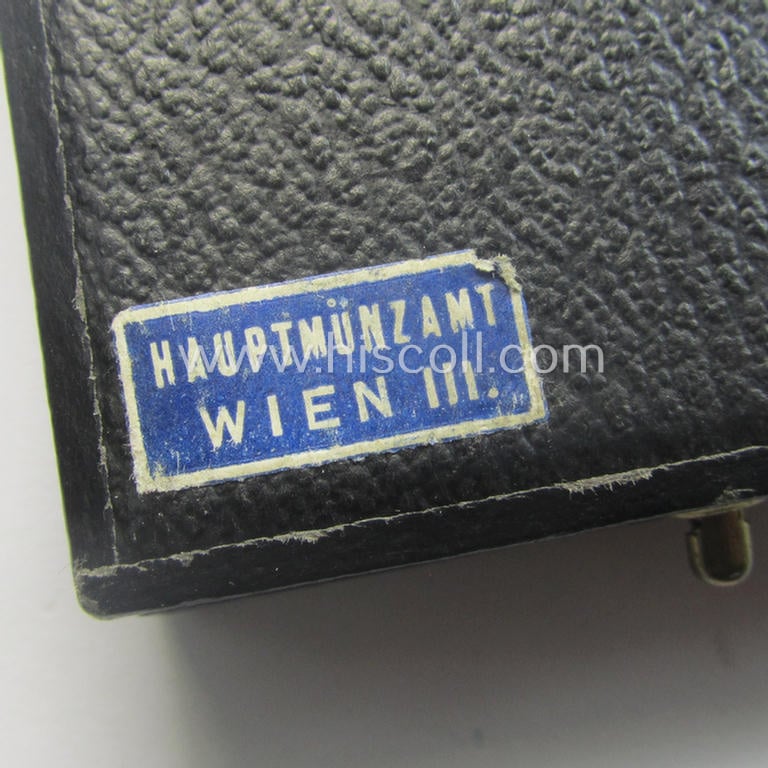 'Verwundeten-Abzeichen in Gold' being a non-maker-marked- and typical 'Buntmetall'-based (and period engraved!) example that comes stored in its maker- (ie. 'Hauptmünzamt - Wien'-) marked etui