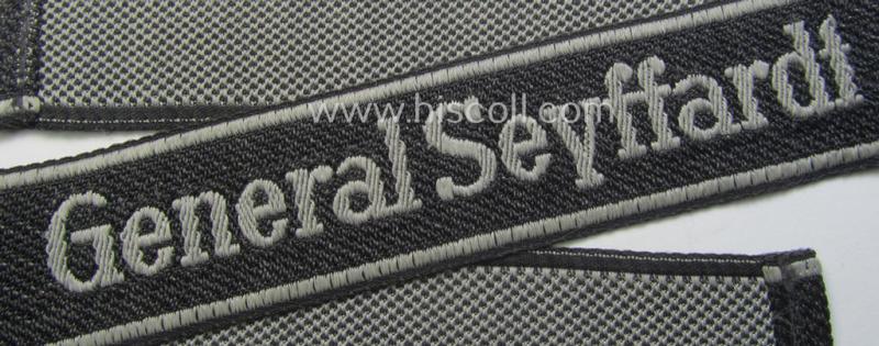 Waffen-SS, 1943-pattern cuff-title (ie. 'Ärmelstreifen') depicting the machine-woven Latin script text in silver-grey linnen as was specifically intended for usage by a member of the: 'SS-Frw.-Panzer-Grenadier-Regiment 48' - “General Seyffardt"