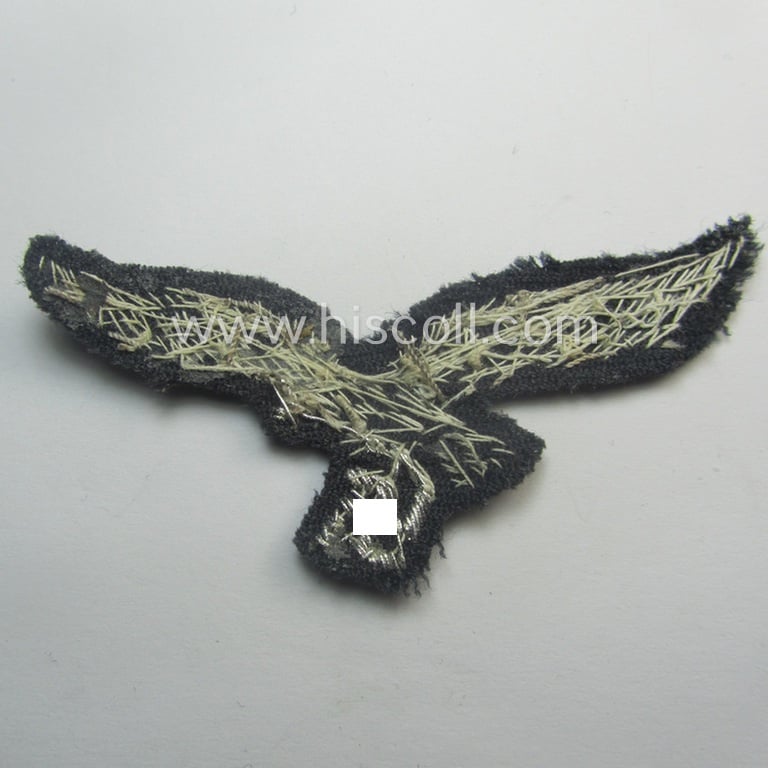 WH (Luftwaffe) officers'-pattern breast-eagle (ie. 'Brustadler für Offiziere der Luftwaffe') being a neatly hand-embroidered example of the: 'Extra Qualität' that comes in a moderately used- (ie. carefully tunic-removed-), condition