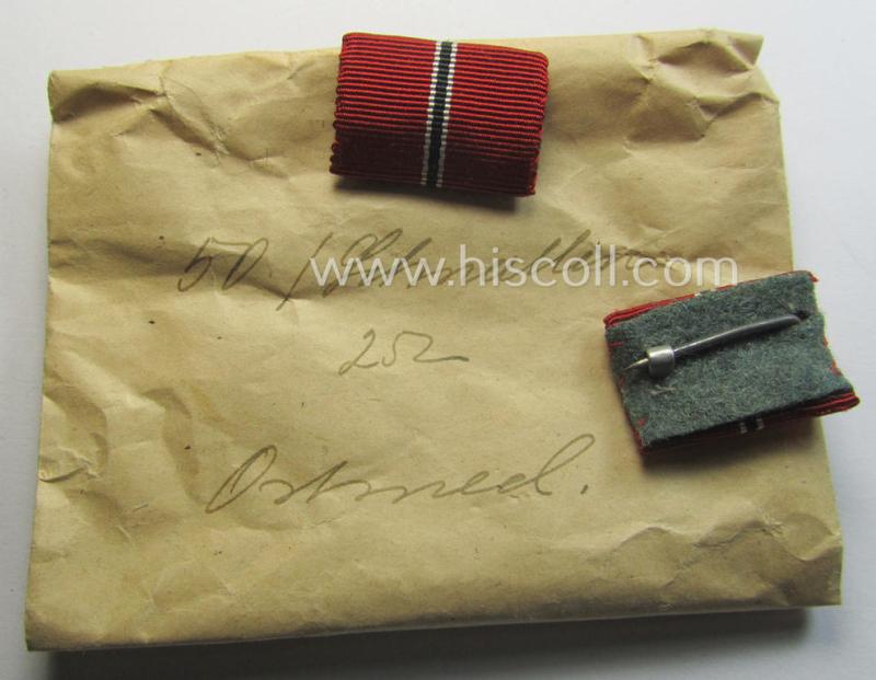 Neat - and simply never issued- nor worn! - single-pieced ribbon-bar (ie. 'Feld- o. Bandspange') as was intended for the: 'Ost'-medal (ie. 'Medaille Winterschlacht im Osten 1941-42')