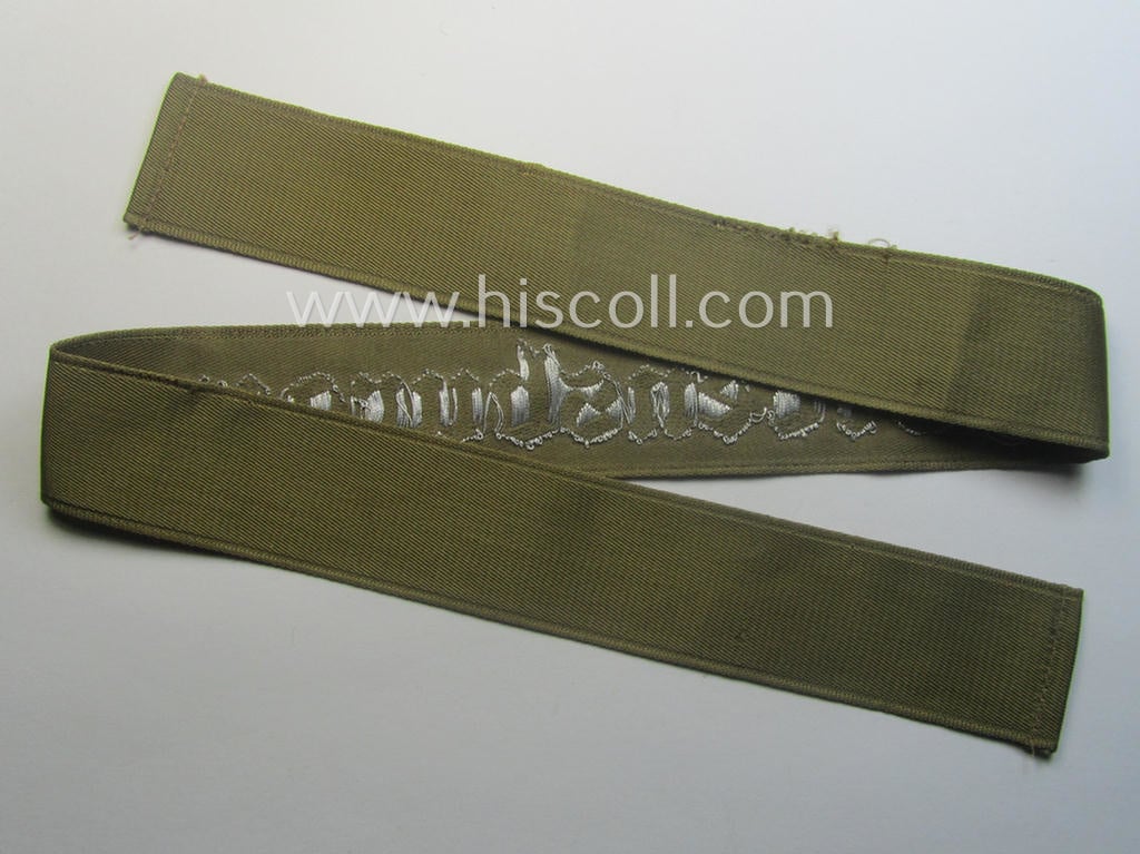 Superb - full length and 'flat-wire'-woven! - 'N.S.D.A.P.'- (ie. 'Politische Leiter'-) related cuff-title (ie. 'Ärmelstreifen') entitled: 'Ordensburgen' (being a 'virtually mint- ie. unissued' example that still retains its 'RzM'-etiket)