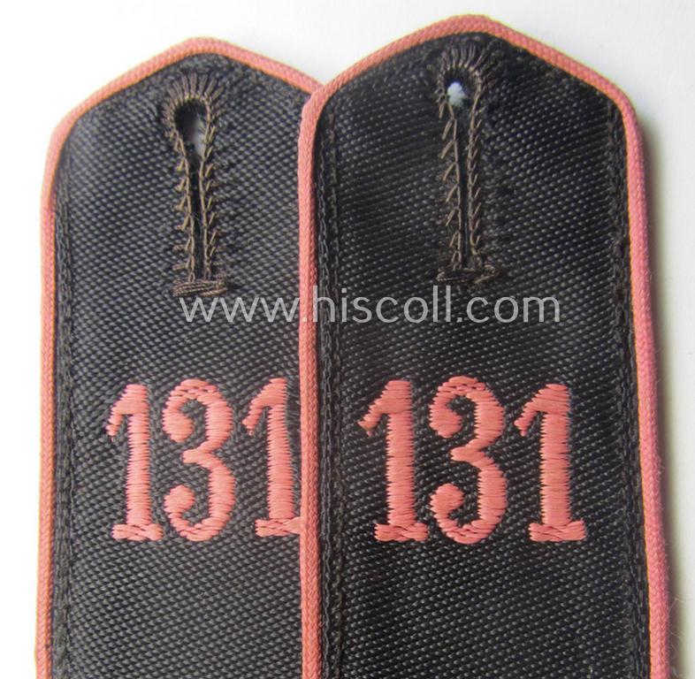 Pair of bright-pink-piped so-called: 'Motor-HJ'-shoulderstraps as was intended for a: 'Hitlerjunge' who served within the 'Bann 131' (131 = 'Bann Hamm' in the 'Gebiet West Westfalen'