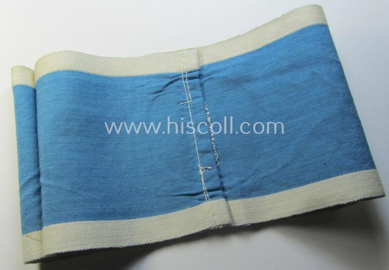 Superb, linnen-based- and/or light-blue-coloured armband (ie. 'Armbinde') depicting an interwoven white-toned circle (ie. dot-) and dito white-coloured borders as was intended for usage by a: 'Luftschutzwart des Reichsluftschutz-Bundes'