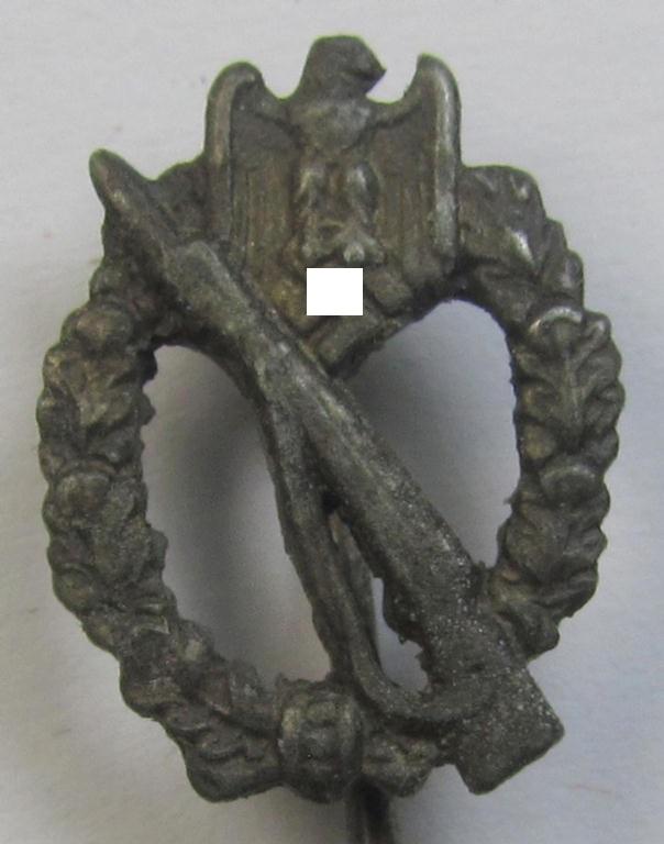 Neat - and 17 mm. sized! - miniature-lapel-pin depicting an: 'Infanterie-Sturmabzeichen in Silber' (or: silver-class infantry-assault-badge ie. IAB) being a non-maker-marked example as executed in silver-coloured zinc-based metal (ie. 'Feinzink')
