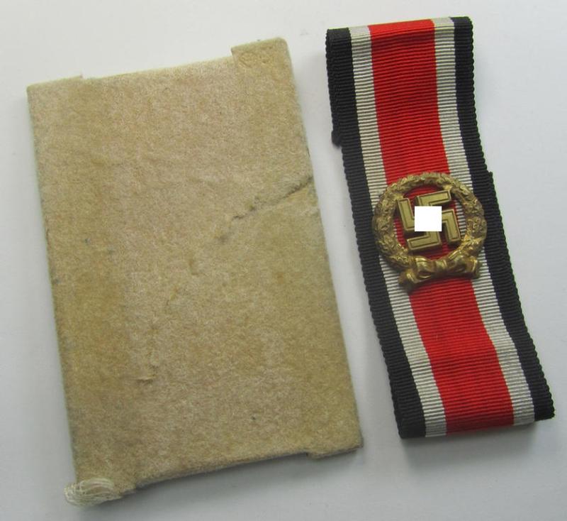 'Ehrenblattspange des Heeres' (or: army honour-roll clasp) being a 'Buntmetall'- (ie. 'Tombak'-) based example by the maker (ie. 'Hersteller') 'Otto Klein & Co.' that comes in its rarely seen black-toned etui