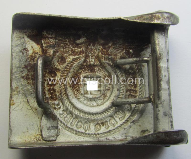 Waffen-SS, EM- (ie. NCO-) type belt-buckle (being a typical, unmarked and typical steel-based: 'Overhoff & Cie'-example) that comes in a surely issued- and/or moderately used- ie. worn, condition