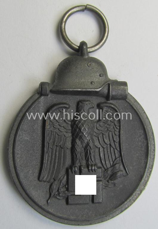 Attractive medal-set: 'Winterschlacht im Osten 1941-42' being a non-maker-marked- (and/or 'Feinzink'-based) specimen and that comes together with its (minimally confectioned) ribbon (ie. 'Bandabschnitt')