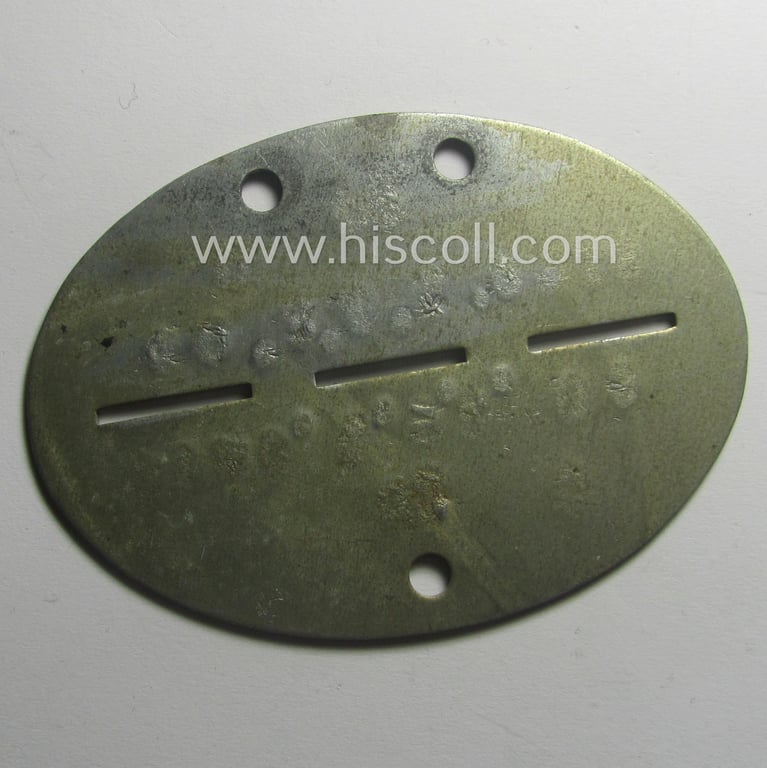 Zinc-based, WH (Heeres) 'Heeres-Infanterie'- (ie. 'GrossDeutschland-Division'-)related ID-disc bearing the clearly stamped unit-designation that simply reads: 'Stab. 1. F.R. GD' and that comes as issued and/or worn