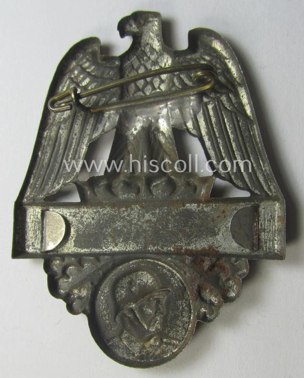 Commemorative, WHW- (ie. 'Winterhilfswerke'-) related 'tinnie' being a non-maker marked example depicting a 'Reichsadler' and showing a soldier wearing a steel-helmet and that is showing the text: 'Wehrfähig'