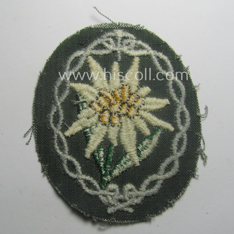 'Variant'-pattern, WH (Heeres) 'Gebirgsjäger'- (ie. mountain-troopers-) related arm-badge, being a desirable example as was executed in the machine-woven pattern on a thin-shaped and/or field-grey-toned background