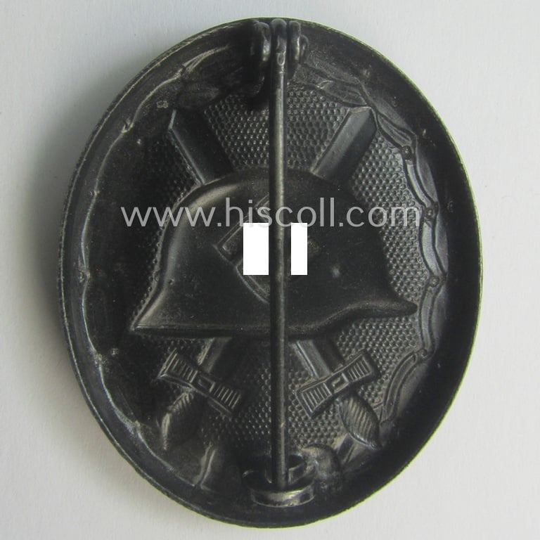 Hardly used- nor worn (ie. 'virtually mint- ie. unissued'!) example of a black-class wound-badge (or: 'Verwundeten-Abzeichen in Schwarz') being a typical magnetic and/or non-maker-marked example