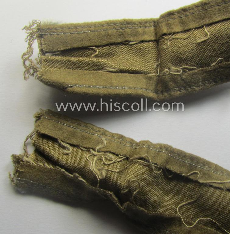 Moderately used, WH cuff-title (ie. 'Ärmelstreifen') entitled: 'Afrika' (being a hardly shortened example that comes in an overall very nice- (ie. issued and clearly worn ie. once tunic-attached-), condition