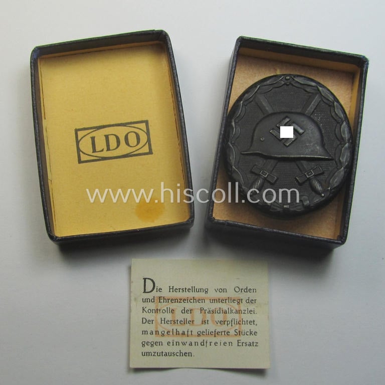 'Verwundeten-Abzeichen in Schwarz' being a maker- (ie. 'L/56'-) marked example by the company: 'Funcke & Brüninghaus' and that came stored in its typical 'LDO'-type etui (ie. two-pieced-box)