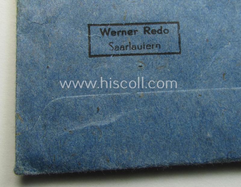 'Ehrenkreuz der deutschen Mutter - zweite Stufe' (or: silver-class mothers'-cross) that came mounted onto its long-sized ribbon and that came stored in its period pouch by the (unusual!) maker: 'Werner Redo - Saarlautern'