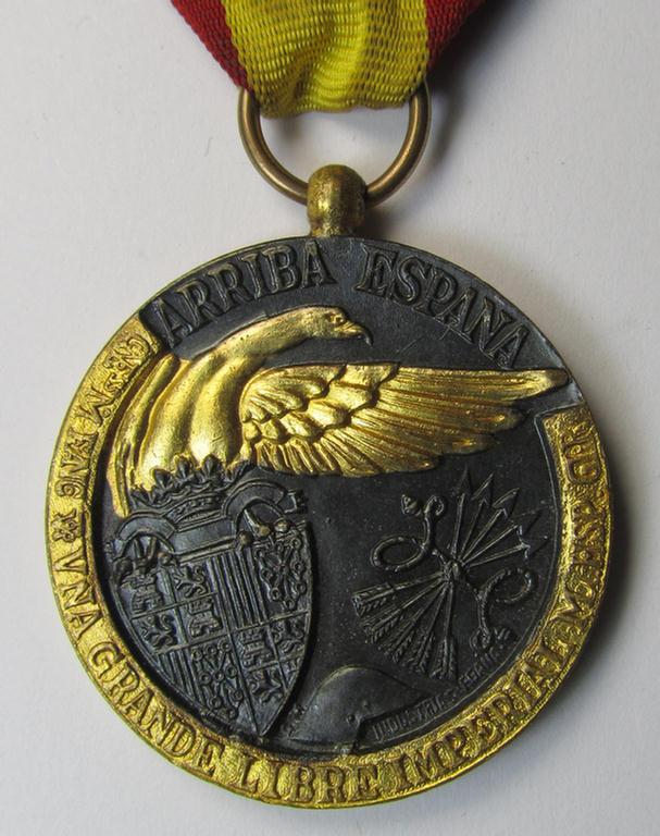 Spanish-issued, Spanish Civil-War commemorative-medal called: 'Medalla de la Campaña 1936-1939' that comes mounted onto its (typically Spanish) mounted ribbon and that comes in a wonderful and hardly used condition