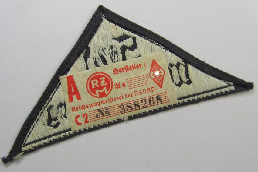 'HJ' ('Hitlerjugend') ie. 'BDM' ('Bund Deutscher Mädel'-) district-triangle (ie. 'Gebietsdreieck') entitled: 'Süd Württemberg' (being an IMO never worn example that still retains its period-attached 'RzM'-etiket)