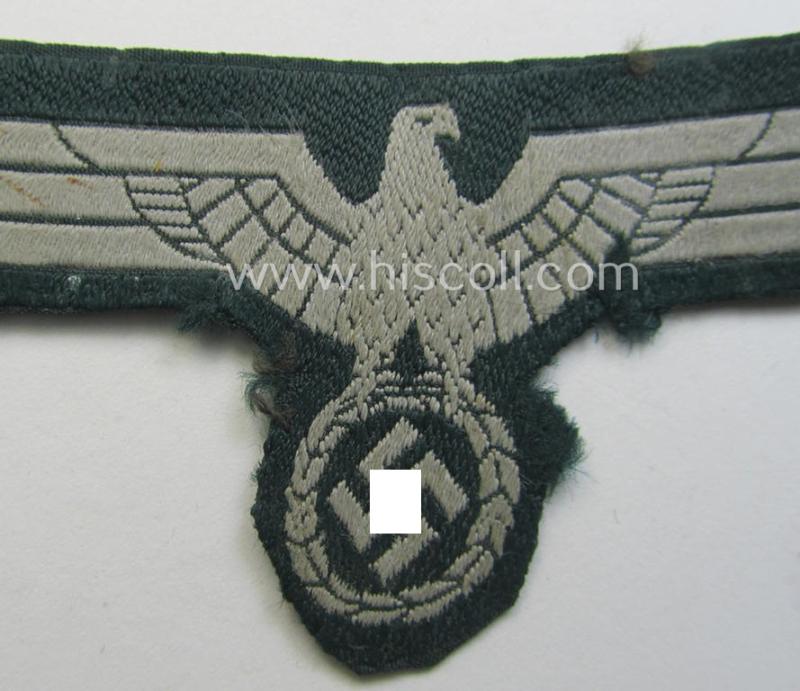 Clearly tunic-removed WH (Heeres) early- (ie. pre)-war-period- and/or greyish-coloured breast-eagle of the so-called: 'M36- (ie. M40-) pattern' (ie. 'Brustadler für Mannschaften u. Uffz.') as was executed in the neat 'BeVo'-weave pattern