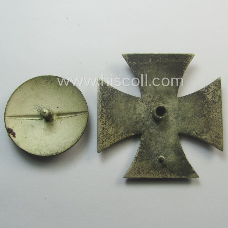 Attractive - and just moderately used! - Iron Cross 1st class (or: 'Eisernes Kreuz 1. Kl.') as executed in the scarcely seen so-called: 'screw-back'- (ie. 'An der Schraube'-) pattern being a typical non-maker-marked example by: 'Steinhauer & Lück'