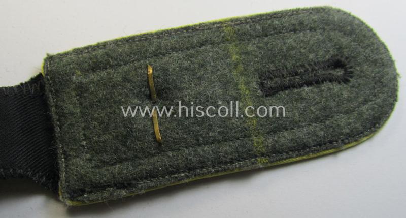 Attractive - albeit regrettably single! - Waffen-SS, NCO-type shoulderstrap as piped in the bright-yellow-coloured branchcolour as was intended for usage by an: 'SS-Oberscharführer' who served within the: 'SS-Nachrichten-Truppen'