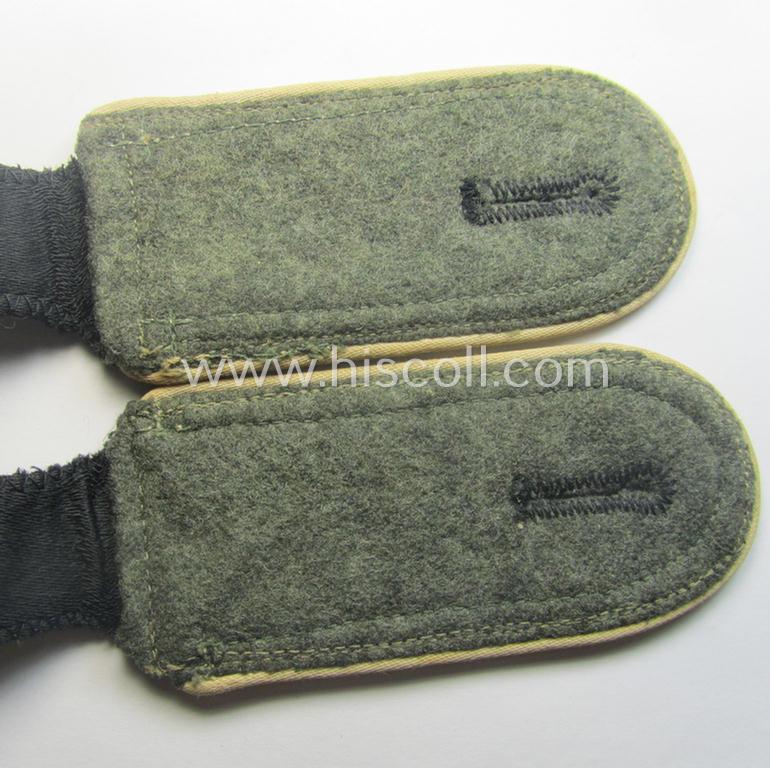Stunning pair of Waffen-SS NCO-type shoulderstraps as piped in the white-coloured branchcolour as was intended for usage by an: 'SS-Unterscharführer' who served within the: 'Waffen-SS Infanterie-Trpn.'