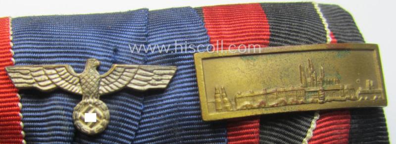 4-pieced WH (Heeres o. KM etc.) medal-bar (ie.: 'Ordenspange') resp. showing an: 'EKII. Kl.', a: 'KvK II.Kl. mit S.', a: 'WH-DA 4. St.' (with eagle-device) and a: Czech 'Anschluss'-medal (with a firmly attached 'Prager Burg-Spange')