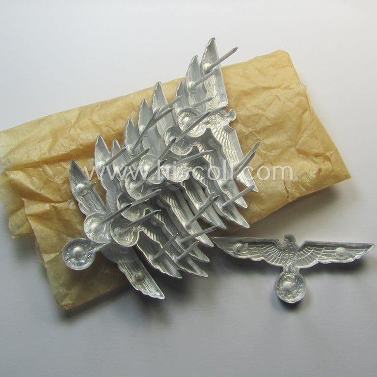 Superb, WH (Heeres) bright-silver-toned (ie. aluminium-based), EM- (ie. NCO- or officers') type visor-cap-eagle being a clearly maker- (ie. 'F.L.L.'-) marked and/or '38'-dated example that comes in a 'virtually mint- ie. unissued'-, condition