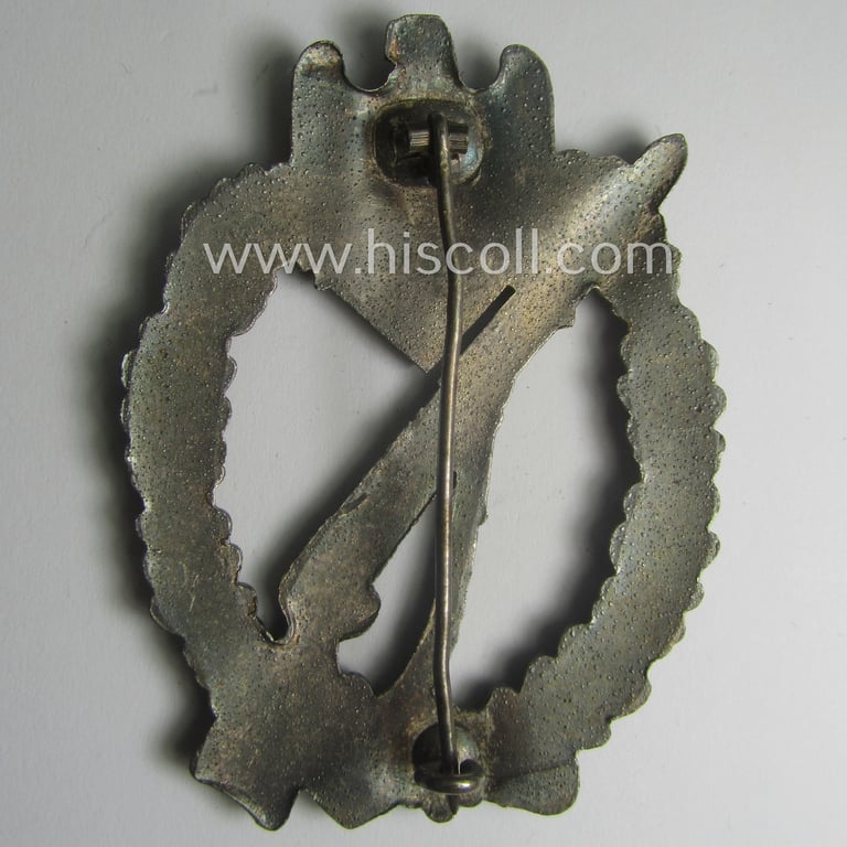 'Infanterie Sturmabzeichen in Silber' (or: silver-class infantry-assault-badge ie. IAB) being a non-maker-marked, so-called: 'solid-back-example as was (I deem) produced by the: 'R.A. Karneth u. Söhne'-company