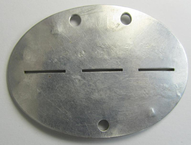 Interesting, aluminium-based WH (Heeres) ie. 'mot. Artillerie'-related ID-disc bearing the clearly stamped unit-designation: '11.Batt.S.Mot.A.R. 263' and that comes together with its 1945-dated agenda (ie. 'Kalender') as stored for decades