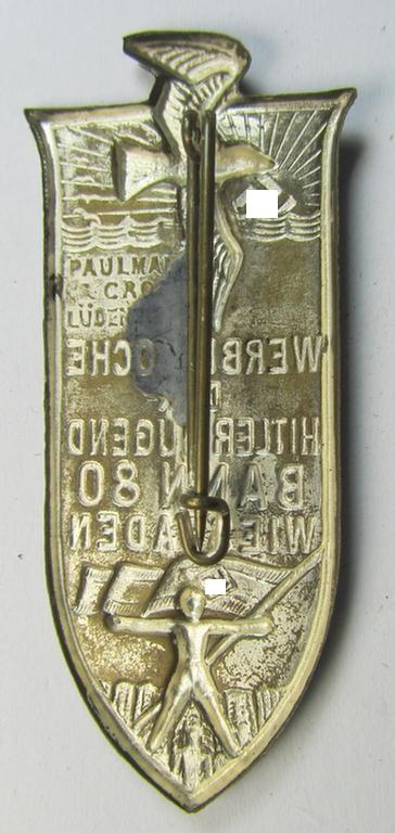 Attractive - and unusual! - HJ (ie.'Hitlerjugend') related 'tinnie' ie. 'Veranstaltungsabzeichen' being a non-maker-marked example showing a sunburst, sea-gull and HJ-flag-bearer and text: 'Werbewoche der Hitler Jugend - Bann 80 - Wiesbaden'