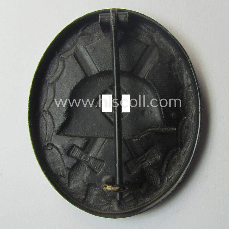 Neat - albeit non-maker-marked and typical non-magnetic! - example of a black-class wound-badge (or: 'Verwundeten-Abzeichen in Schwarz') that comes in an overall nice- (ie. I deem just minimally used-), condition