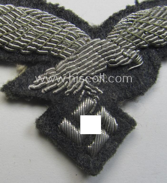 WH (Luftwaffe) officers'-pattern visor-cap-eagle (ie. 'Adler für LW-Offiziers-Schirmmütze') being a neatly hand-embroidered example of the: 'Extra Qualität' that comes in a moderately used- (ie. carefully cap-removed-), condition