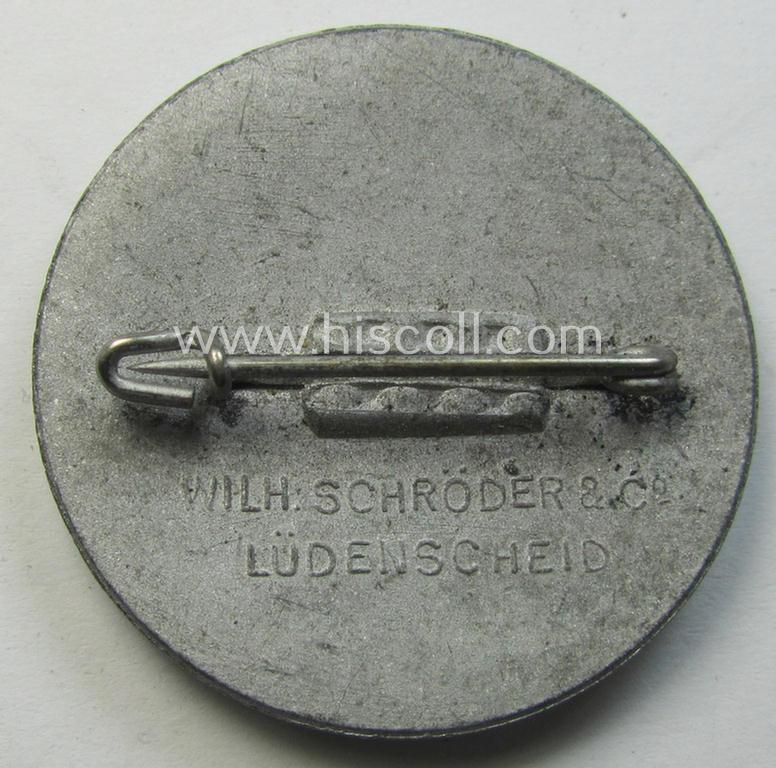 Bright-silver-toned, N.S.D.A.P.-related 'tinnie' (ie. 'Tagungs- o. Veranstaltungsabzeichen') being a neatly-maker- (ie. 'Wilh. Schröder & Co - Lüdenscheid') marked example showing a (typical) rounded swastika surrounded by a sunburst