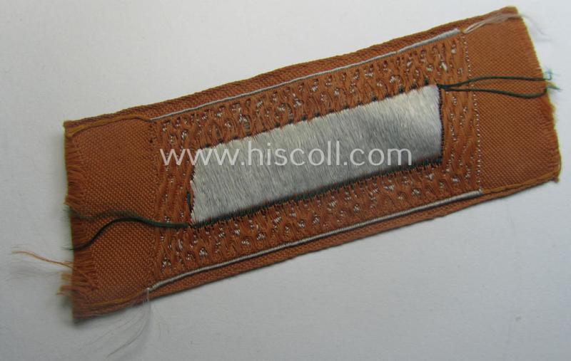 Regrettably single, (entirely!) 'BeVo'-woven, NCO-pattern 'Ostvölker'-collar-tab as intended for a: 'Nord-Kaukasischer'-volunteer within the 'Deutsche Wehrmacht' (ie. 'Zugführer' within the: 'Nord-Kaukasischer Legion')