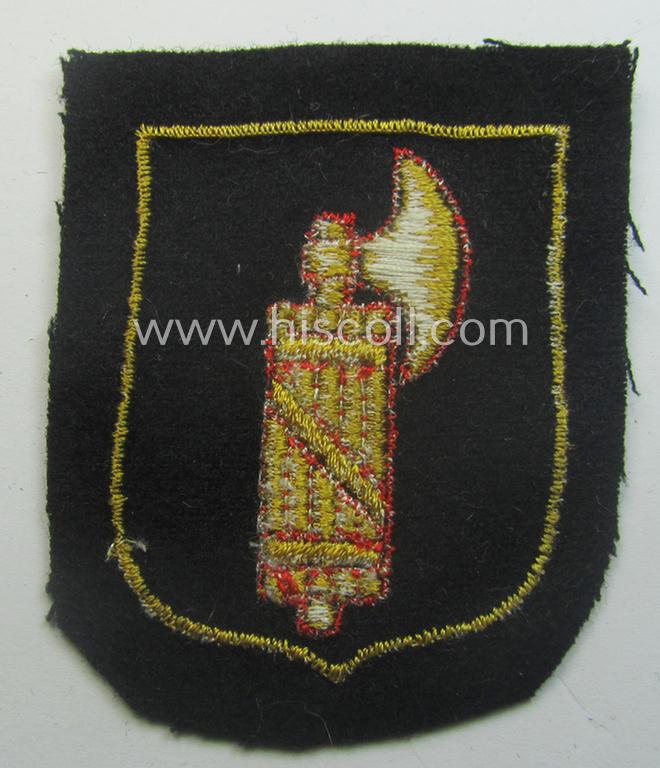 Italian, Waffen-SS 'volunteer' arm-shield as was specifically intended for usage by soldiers of the: '29. Waffen-Grenadier-Div. der SS' ('Italienische Nr. 1' or: 'Legione SS Italiana') that comes in a 'virtually mint- ie. unissued', conditi...