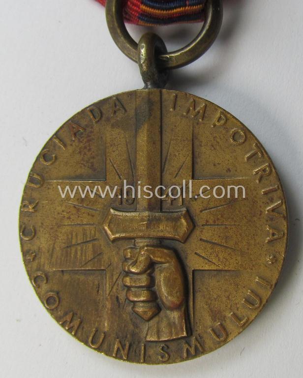 Romanian medal: 'Kreuzzug gegen den Kommunismus' (or in Romanian language: 'Medalia - Crusiada Impotriva Communismului') that comes mounted onto its original (and neatly pre-confectioned!) ribbon as issued