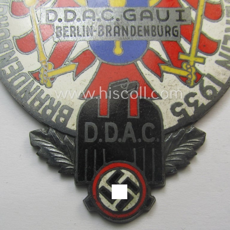 Commemorative, multi-coloured enamelled D.D.A.C.-related plaque (ie. 'Erinnerungs- o. nichttragbare Kfz.-plakette') showing a detailed 'D.D.A.C.'-logo, a red-eagle-device and text: 'Brandenbürgische Dauerprüfungs-Fahrt - Berlin - 1935'
