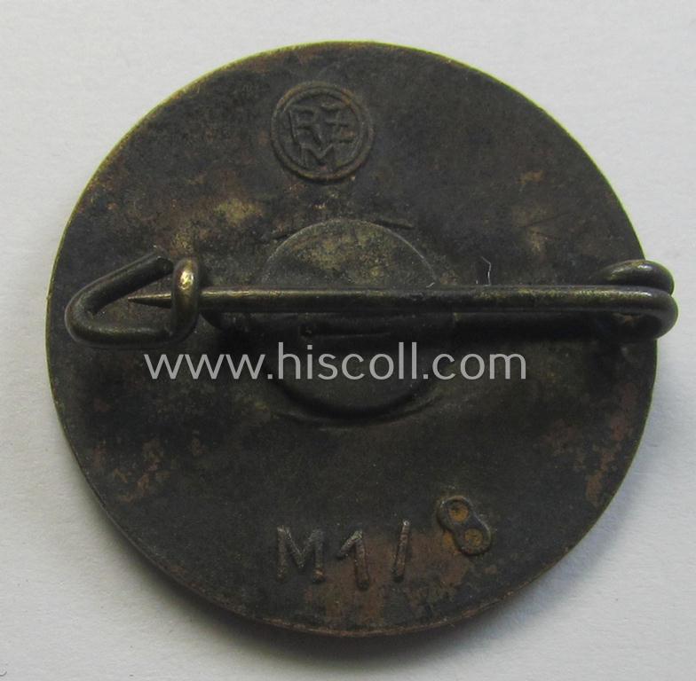 Neat - bright-red-coloured and nicely preserved! - 'N.S.D.A.P.'-membership-pin- ie. party-badge (or: 'Parteiabzeichen') which is maker-marked on its back with the makers'-designation: 'RzM' and/or: 'M1/8'